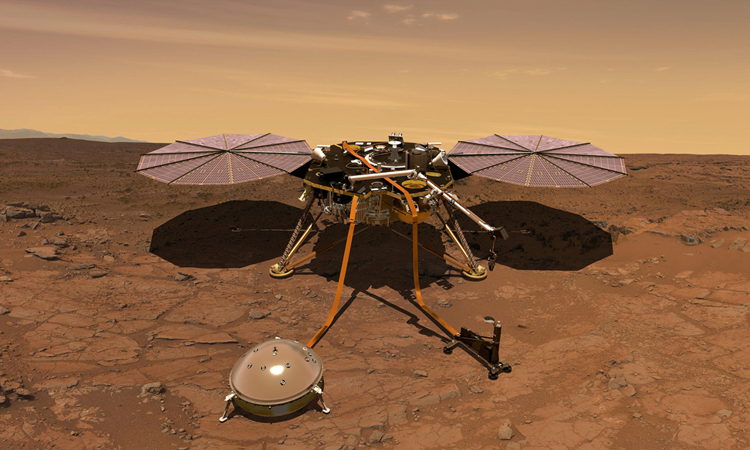 Trạm InSight đặt máy đo địa chấn trên bề mặt sao Hỏa. Ảnh: NASA.